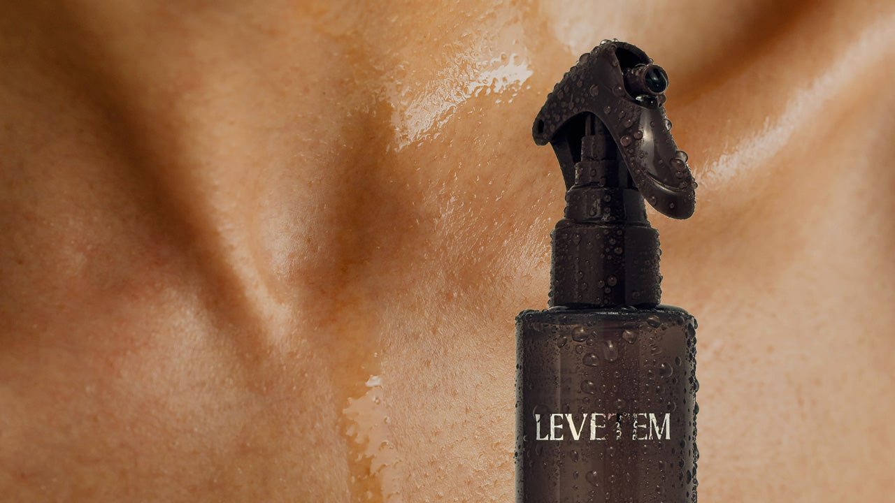 Spray bottle labeled 'LEVETEM' against  skin